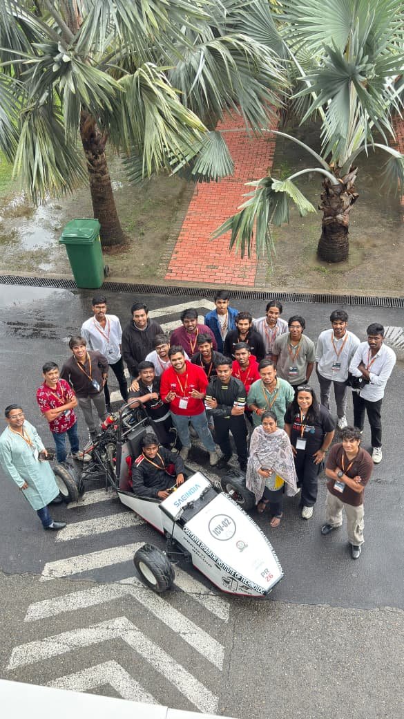 Praheti Racing SAE CBIT team members gathered around the PR26 car